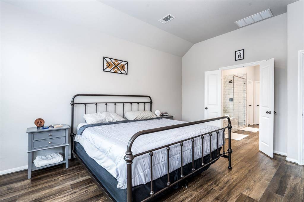 Double doors open to a spa like primary en-suite! Do you prefer steam or bubbles? Love the floors that are throughout the downstairs.