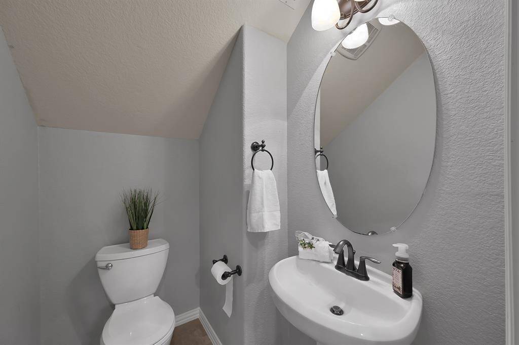 Guest Bath just off the entry and den area.