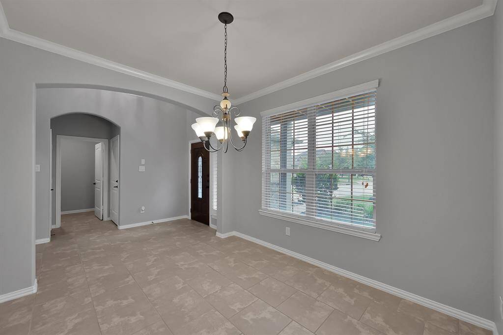 Another view of the dining room. Lots of light from the picture window!
