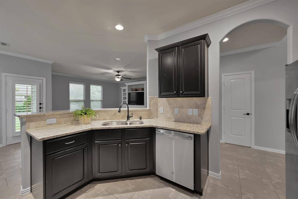 Newly installed dishwasher rounds out the stainless appliances in this well appointed kitchen.