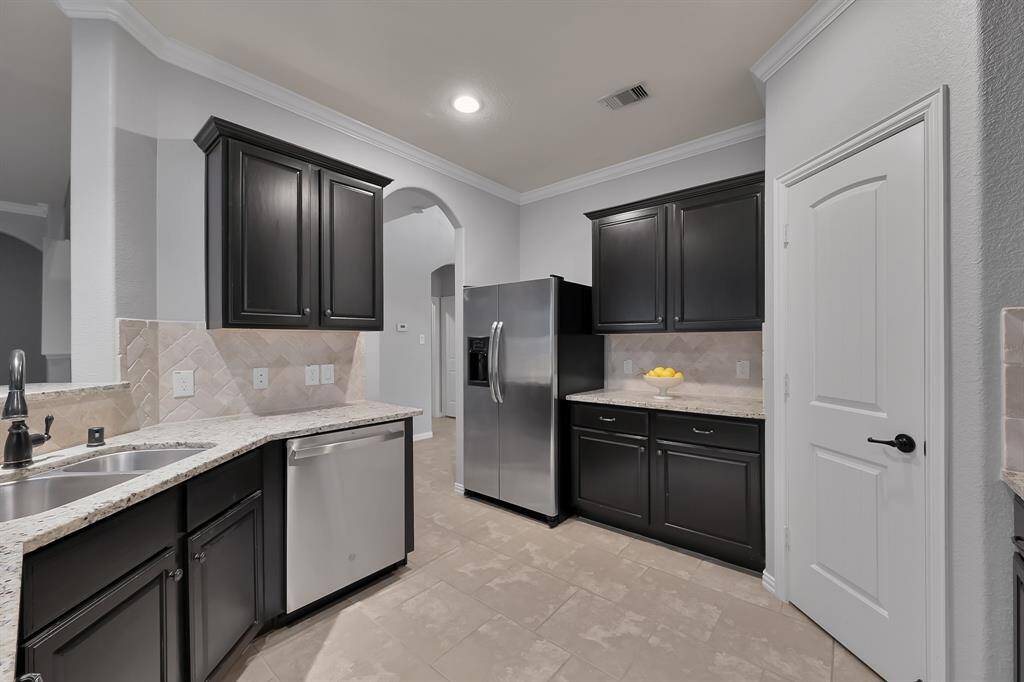 Refrigerator included. Note the area between the fridge and pantry - Perfect spot for a Coffee Bar!