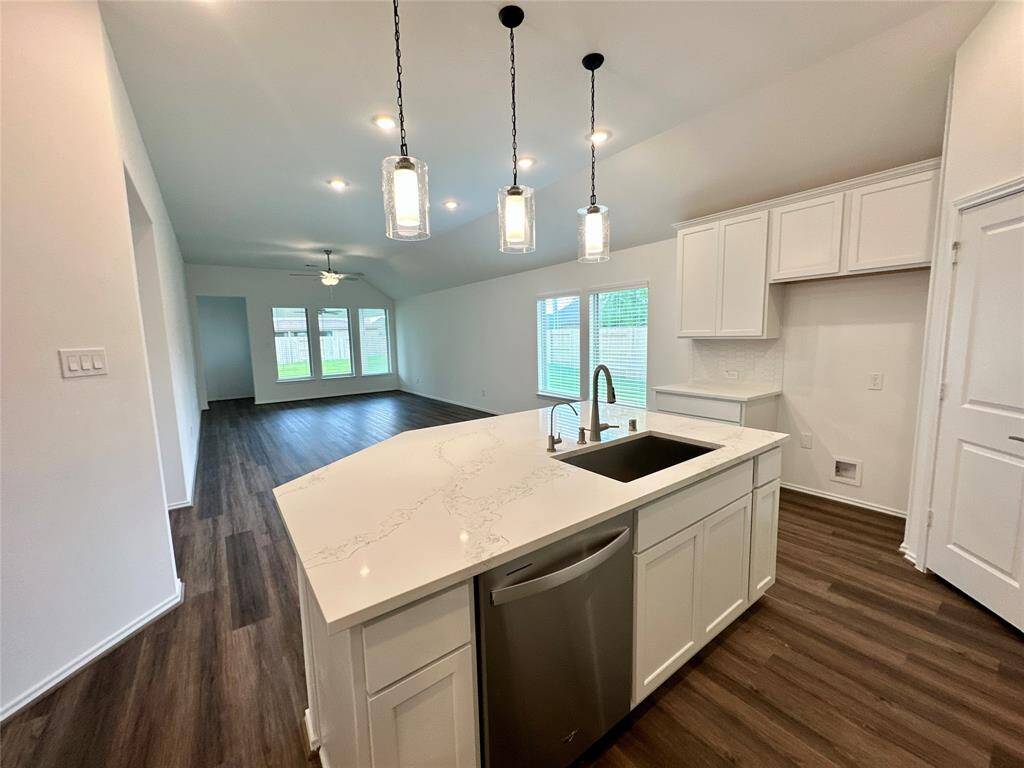 Beautiful open floor plan. The color scheme is just beautiful.