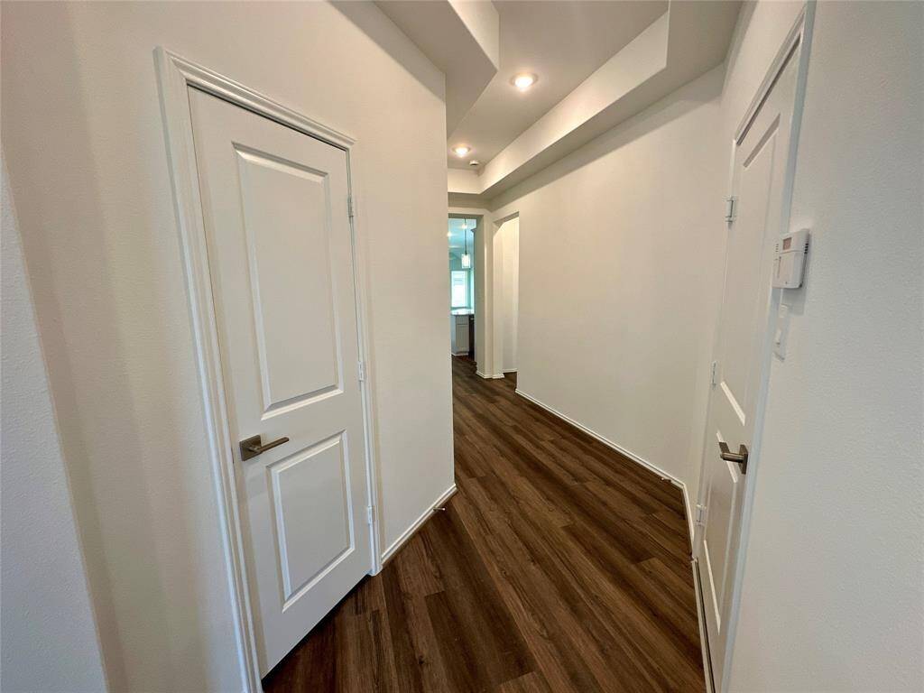 Foyer with coat closet.