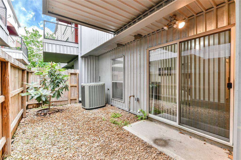 Backyard space for a dog or relaxing with a morning cup of coffee.