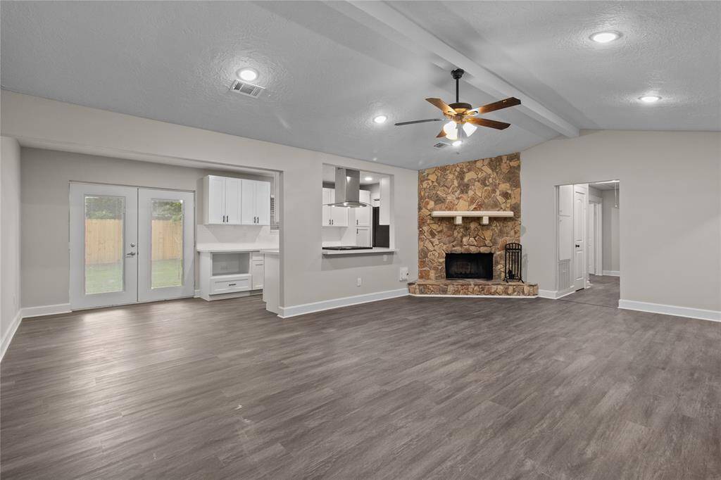 Open and spacious living area with FP.