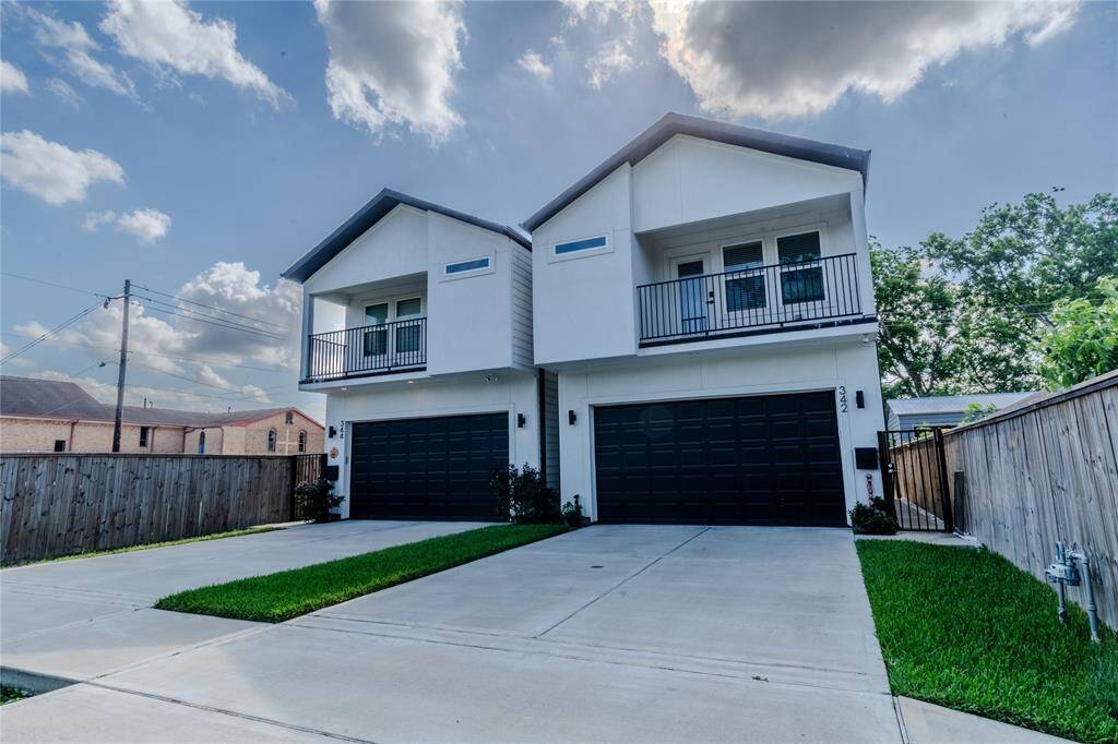342 Hahlo is the home on the right. The balcony upstairs is off of the primary bedroom with private ensuite.