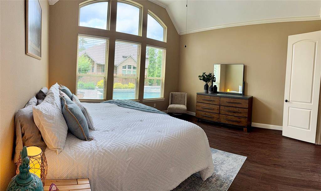 The spacious primary bedroom is located on the first level