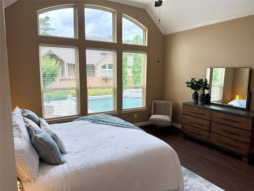 Primary room with a view.  Check out that pool just outside the window!