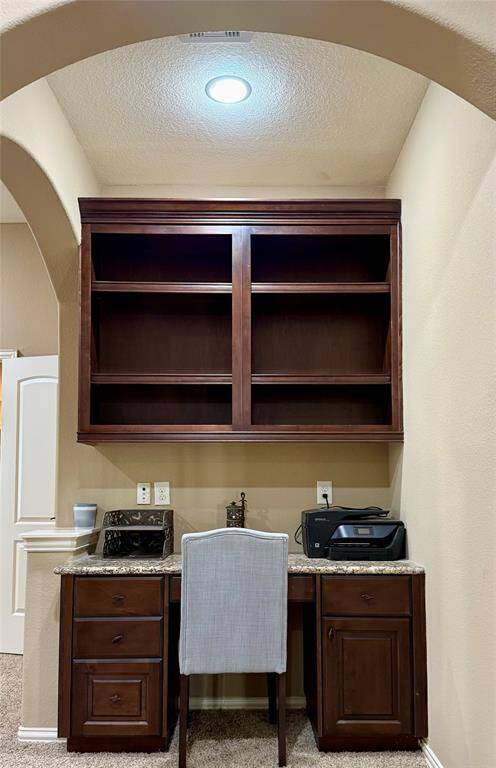 Desk area located just at the top of the stairs.