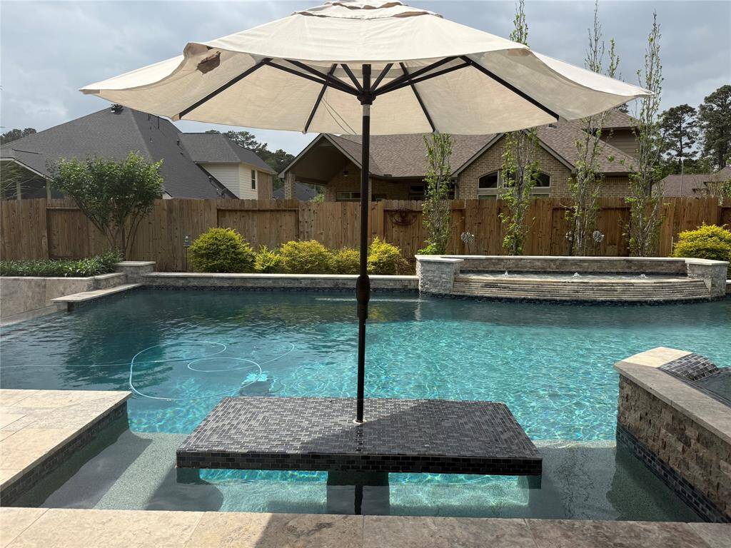 Why get out of the pool for lunch.... just eat it here at the build in picnic table instead!