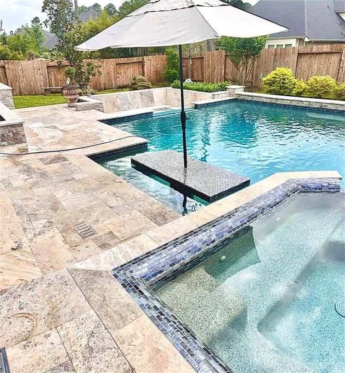 This pool and backyard are simply a must see!!