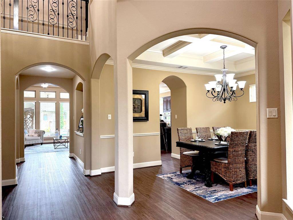 Upon entering the front door, you can look past the arched corridor for a view of the gorgeous backyard!