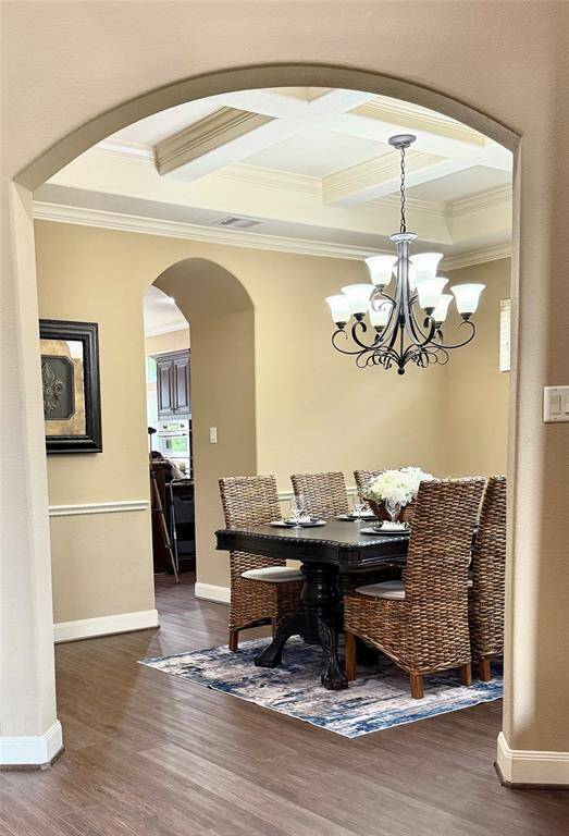 Large formal dining room directly off the entryway with access to the kitchen.