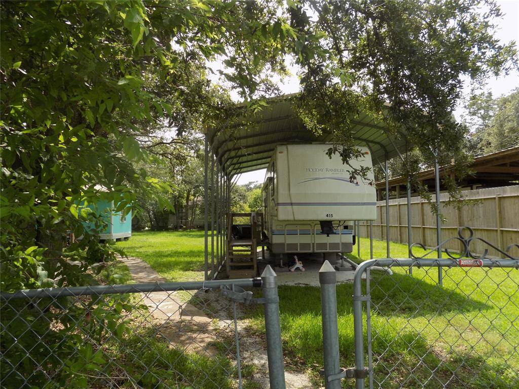 Covered area helps protect the RV unit.