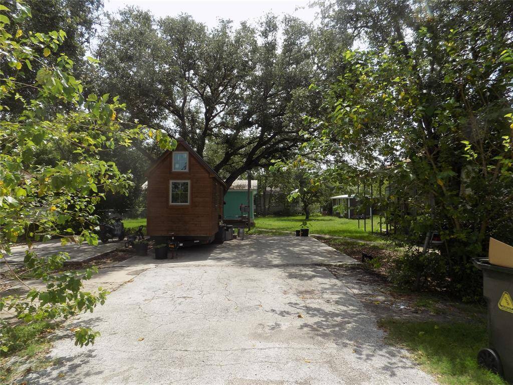 Beautiful property with income producing amentities that are all staying. 2 tiny homes, a cottage and and a RV. @ nore spots are oermitted from the county for another RV or tiny home.