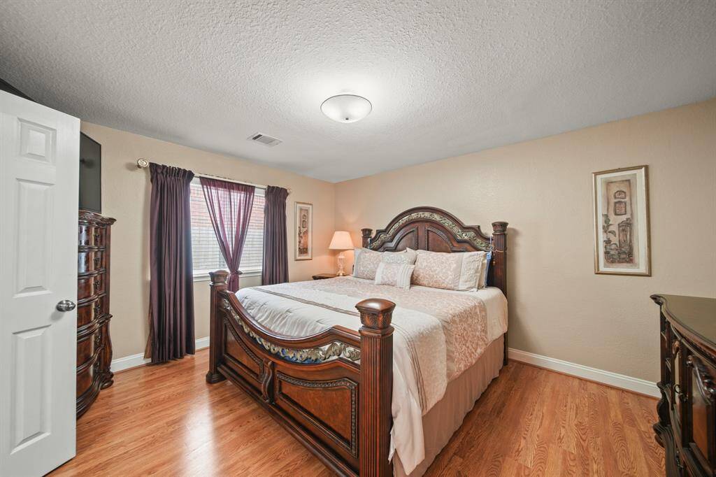 This cozy primary bedroom.