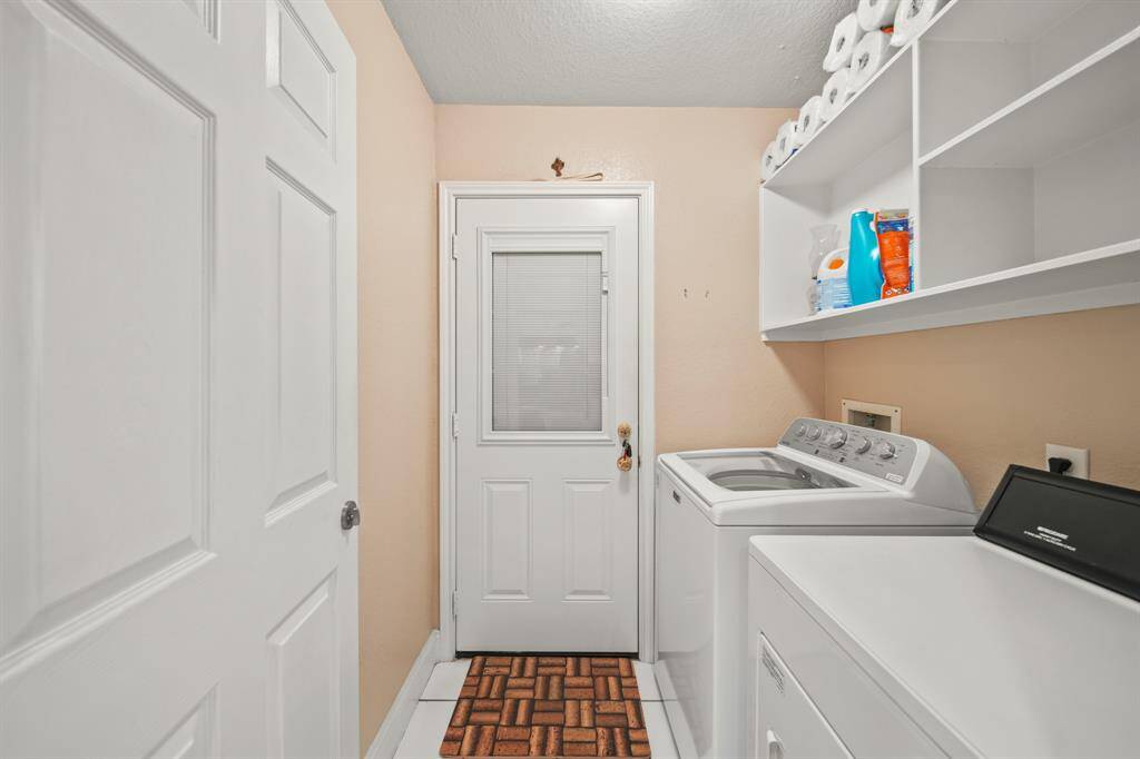 High-quality washer and dryer set in a sleek, modern-style laundry room.