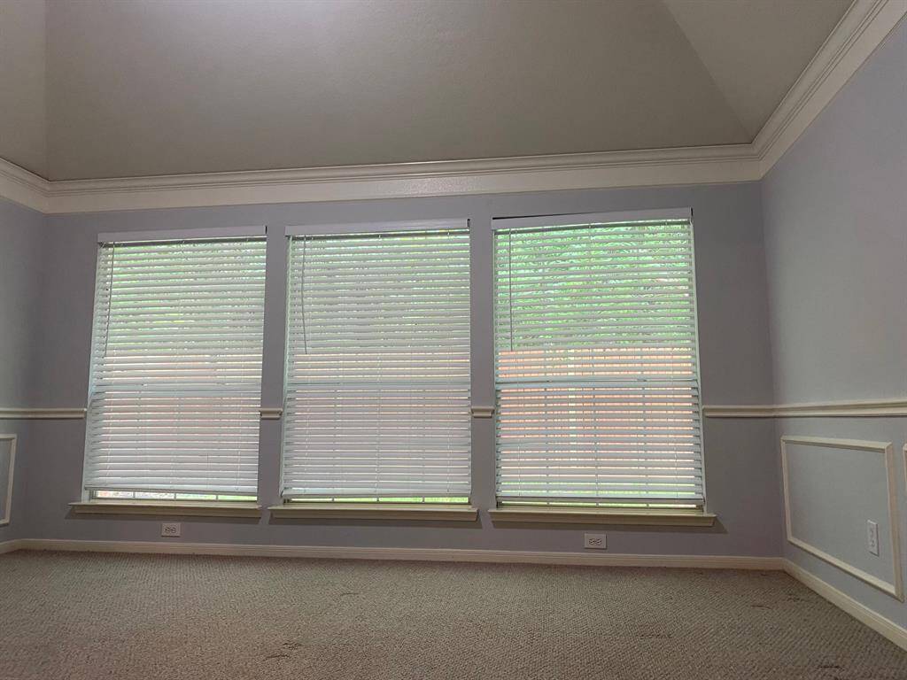Primary Suite with trey ceiling and crown moulding