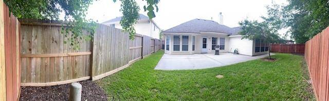 Panoramic view of the back of house and yard