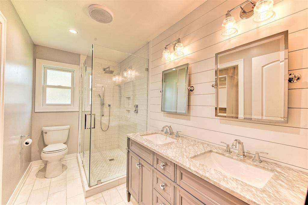 Primary bathroom offers a beautiful updated area.  It is even nicer in person.  A must tour home.