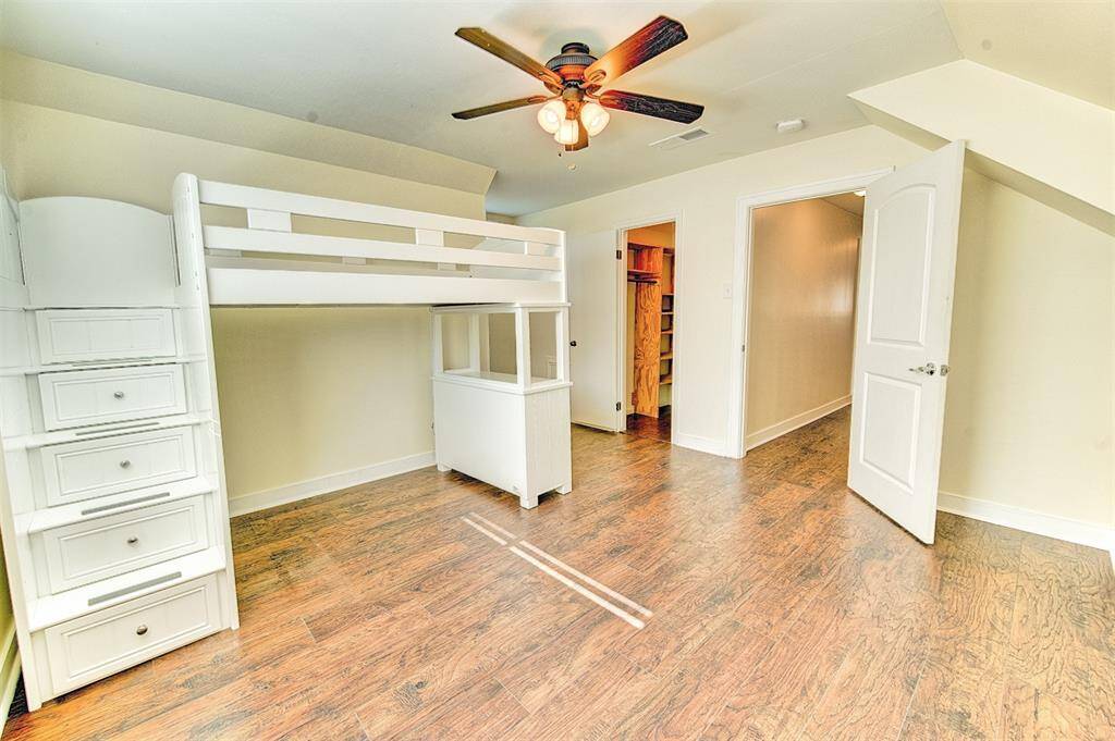 Bedroom number 4 offers 2 walk in closets. This bunk bed can stay with the home, or the owners will remove it if new buyers do not want it to stay.  It is the buyers choice.