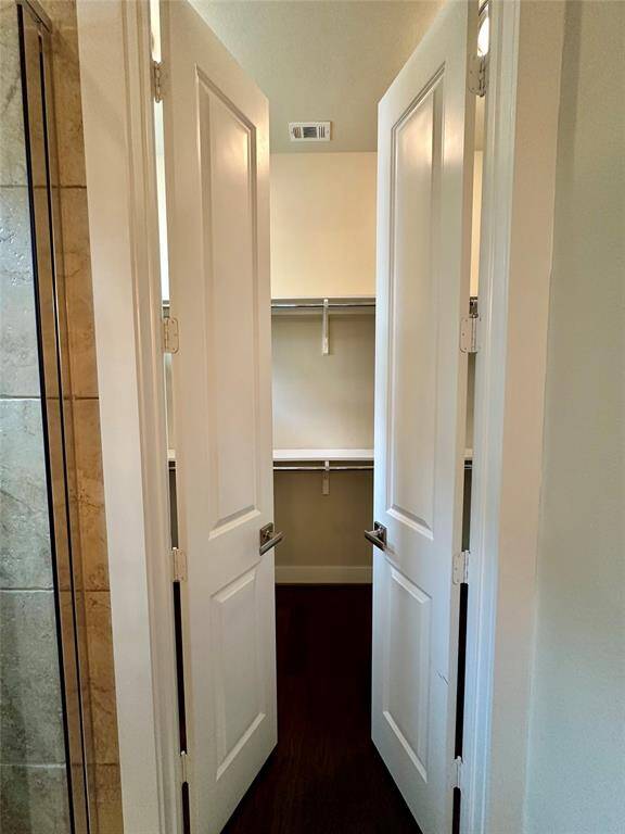 Enter primary closet.