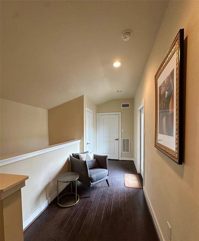 4th floor offers a good size open space/landing to set up a desk or office nook. You have even more extra storage space with a fully finished out closet and attic storage both.