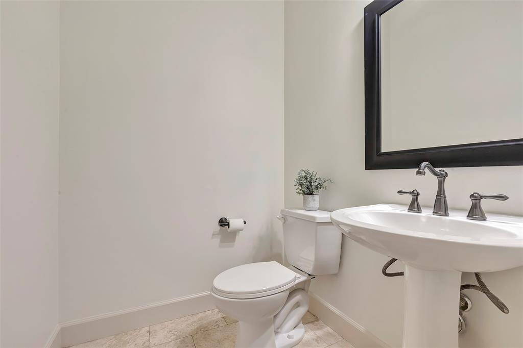 Half bath located off of the living and dining rooms.