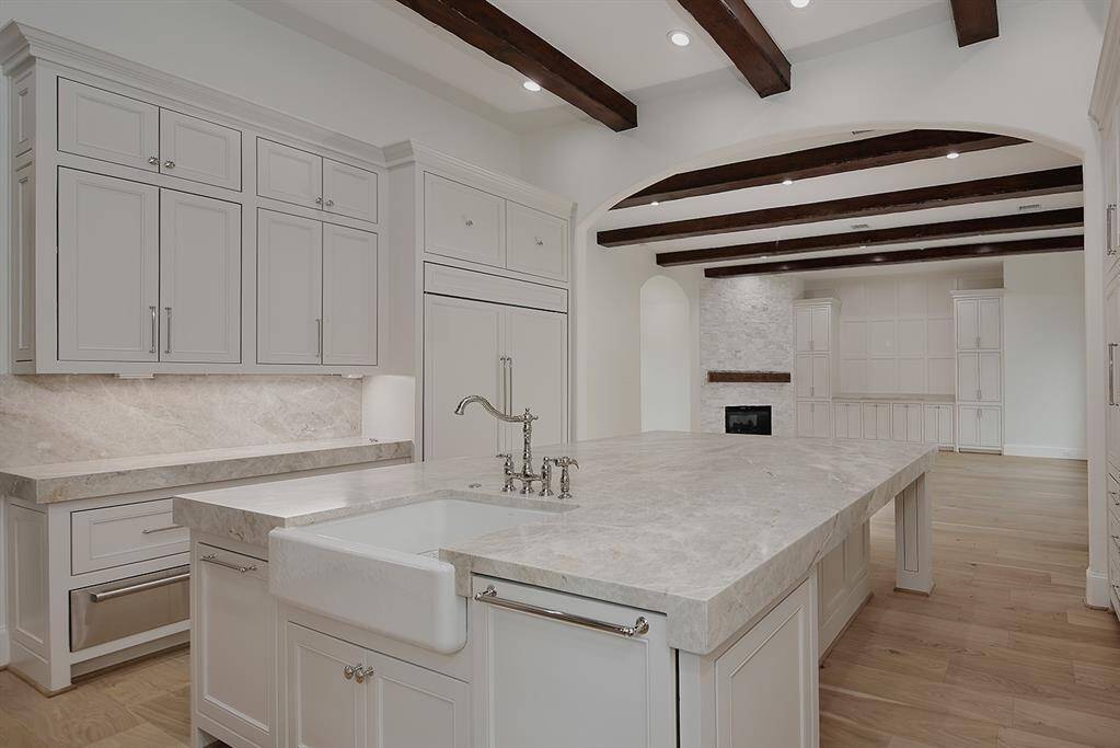 All new soft close custom cabinetry and drawers, walk-in pantry and catering kitchen nearby with 2nd refrigerator.
