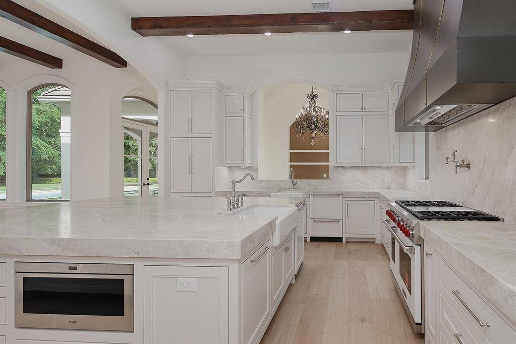 The stunning kitchen opens to the family room and breakfast room, that's so large it could be used as a formal dining room too.
