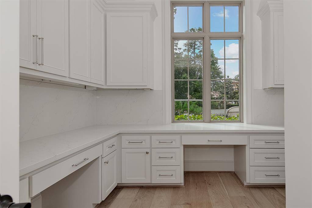 This built-in study nook near the kitchen would make a great home work area, or home management space.