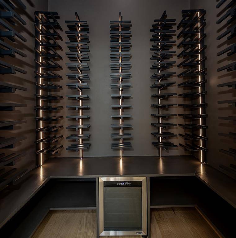 The sleek wine room is vented, and can be enclosed and climate controlled if needed.