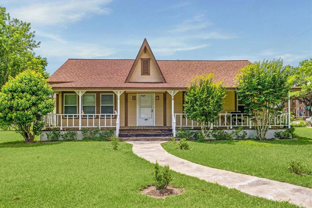 Freshly painted and full of charm, this historical corner-lot home is a rare find—sitting on a huge double lot with plenty of space to spread out.