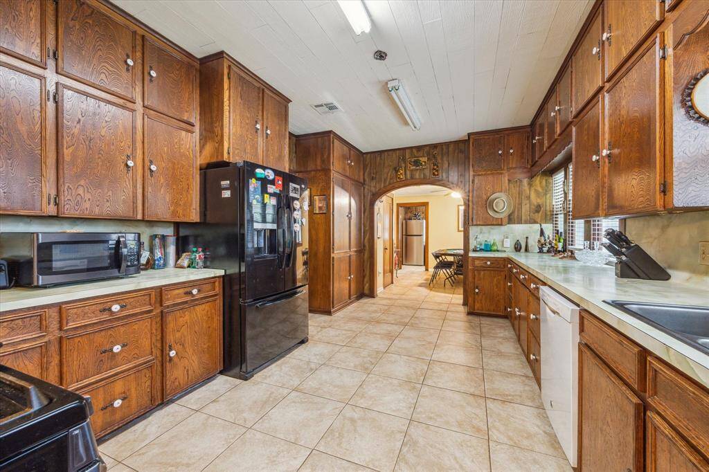 torage galore! This angle highlights just how much cabinet space you’ll have—paired with 18” ceramic tile flooring for a clean, functional look.