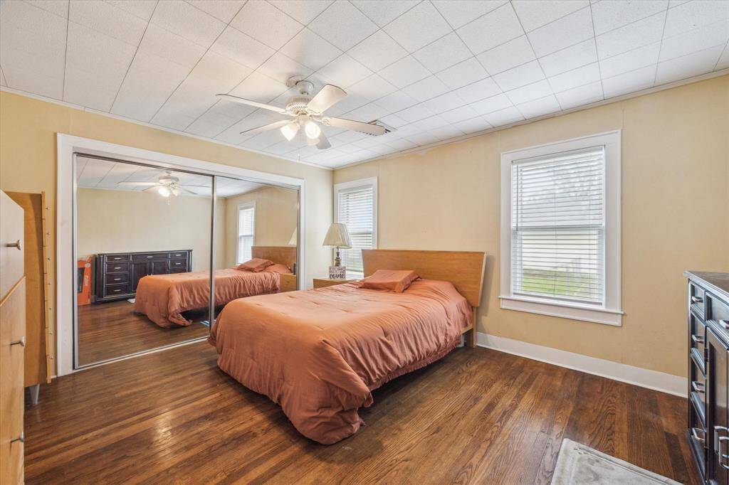 The primary bedroom offers great light, a mirrored closet, and a private ensuite bath—everything you need for a peaceful retreat.