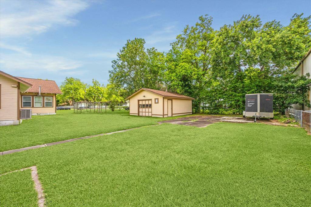 Fully fenced-in garden keeps your fruits and veggies safe from pests. Bonus concrete slab beside the workshop is perfect for additional storage, a future shed, or even outdoor entertaining.