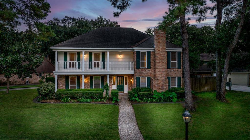Classic southern architecture with large covered front porch and veranda.