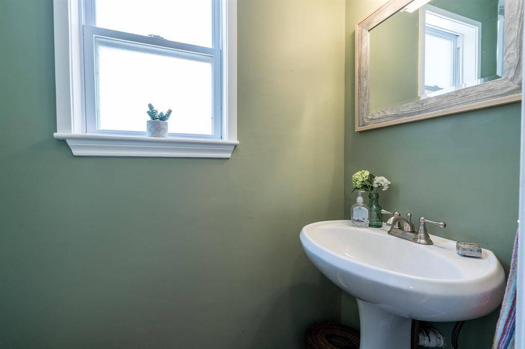 Nearby half bath convenient for guests.