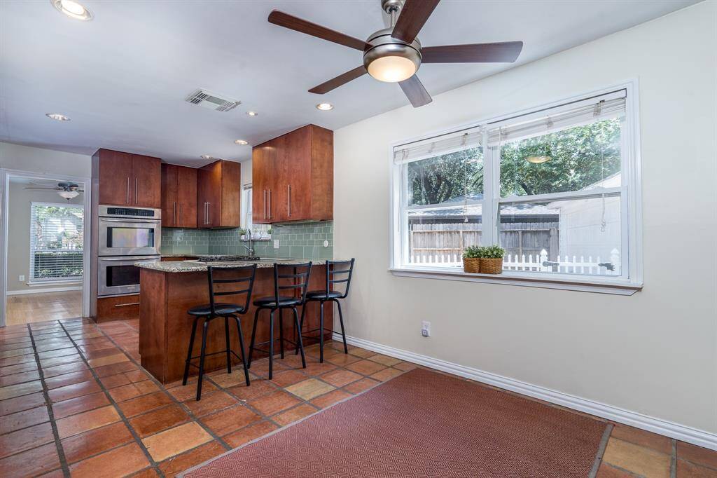 Breakfast area is open to the remodeled kitchen.