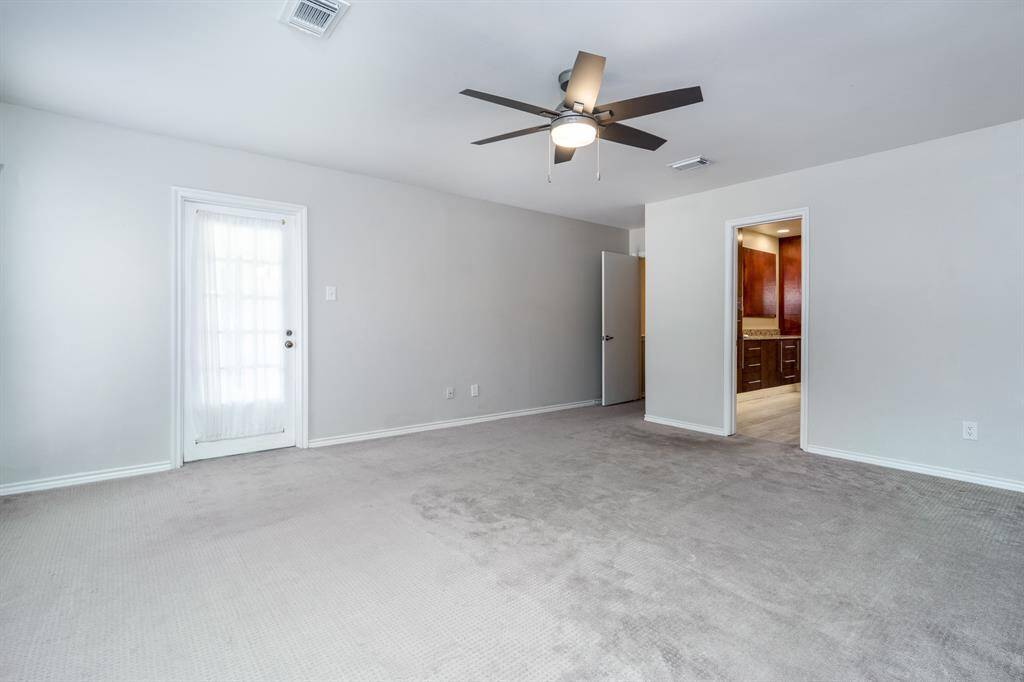 Opposite view of the primary, the bedroom has two closets.