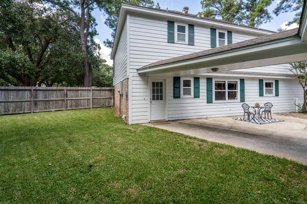 Backyard has plenty of room for pets or play.