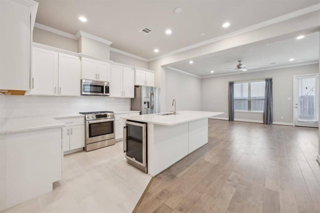 Stainless steel appliances with a built-in wine fridge
