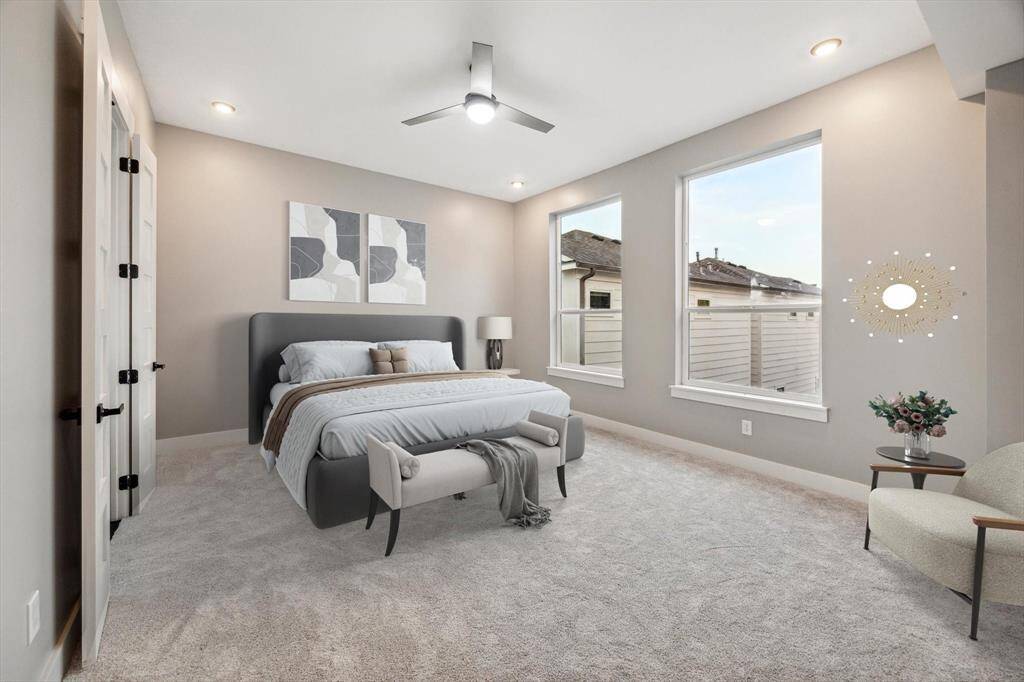 Massive primary suite w tons of natural light*This area has been virtually staged