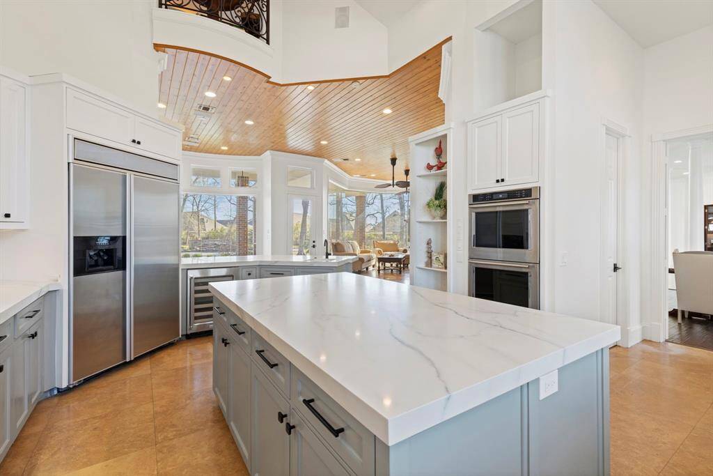 With ample storage, walk-in pantry, double ovens and beverage fridge you are set for family meals or hosting parties and holidays.