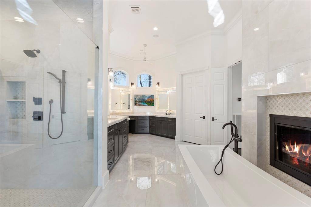Be prepared to be blown away in the opulent tranquility of the primary ensuite with this elegantly remodeled primary suite bathroom.