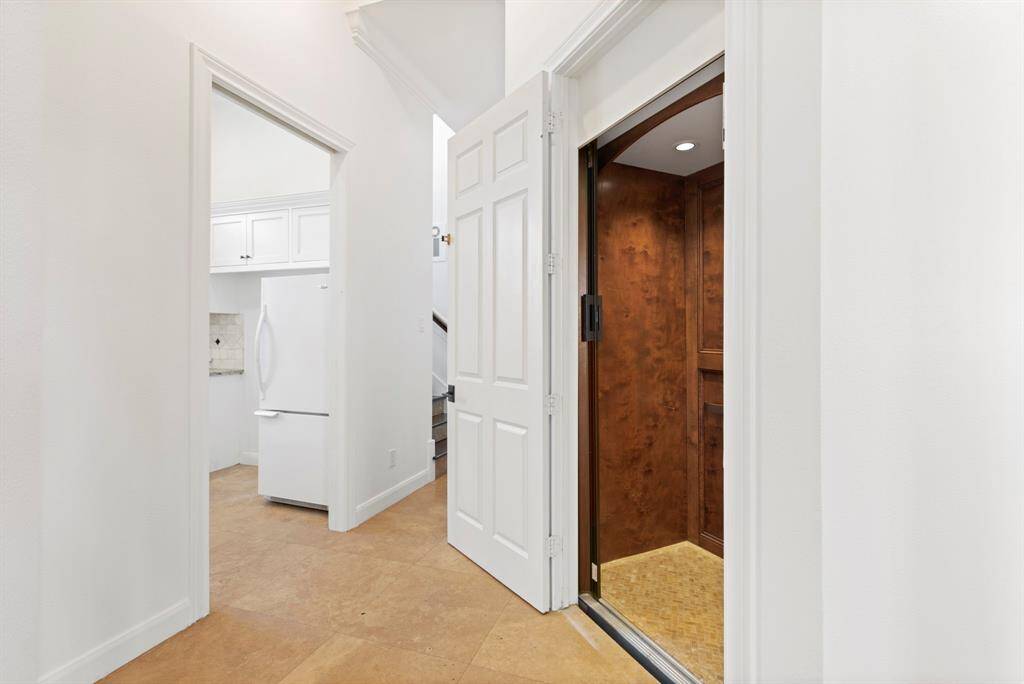 Glide effortlessly between luxurious levels in your private elevator, a rare find in modern living. This elegant feature adds a touch of sophistication while ensuring unparalleled convenience.