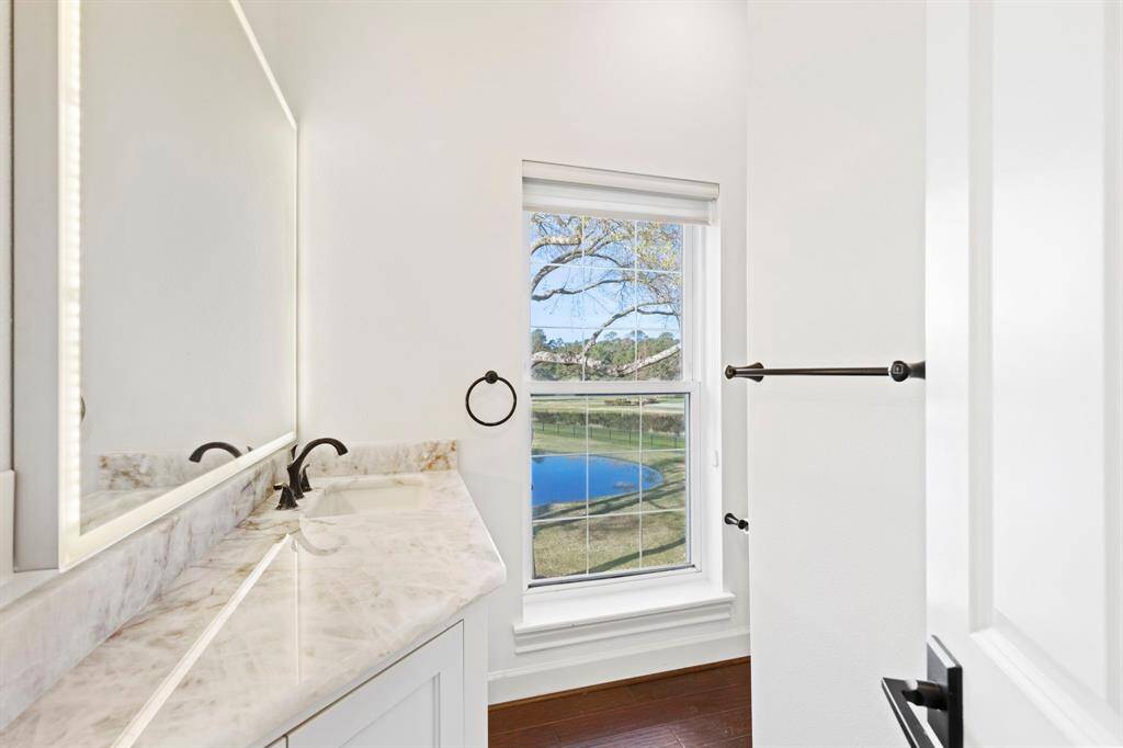 This private wing has full bathroom with updated counters, cabinets and walk-in shower.