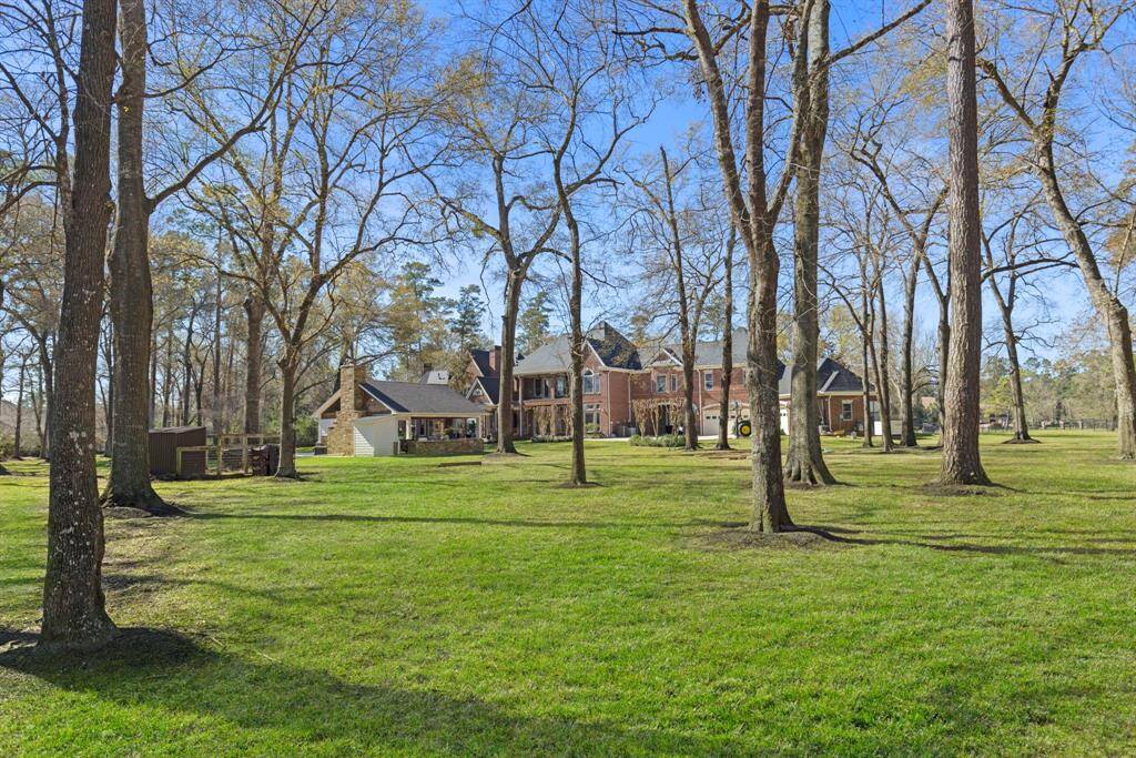 Nestled amidst a serene tapestry of mature trees and immaculate lawns, this palatial estate invites you to indulge in tranquil luxury. Its expansive grounds offer an enchanting backdrop for outdoor gatherings or moments of solitude under nature's canopy. A perfect fusion of elegance and earthly splendor awaits within this exquisite retreat.