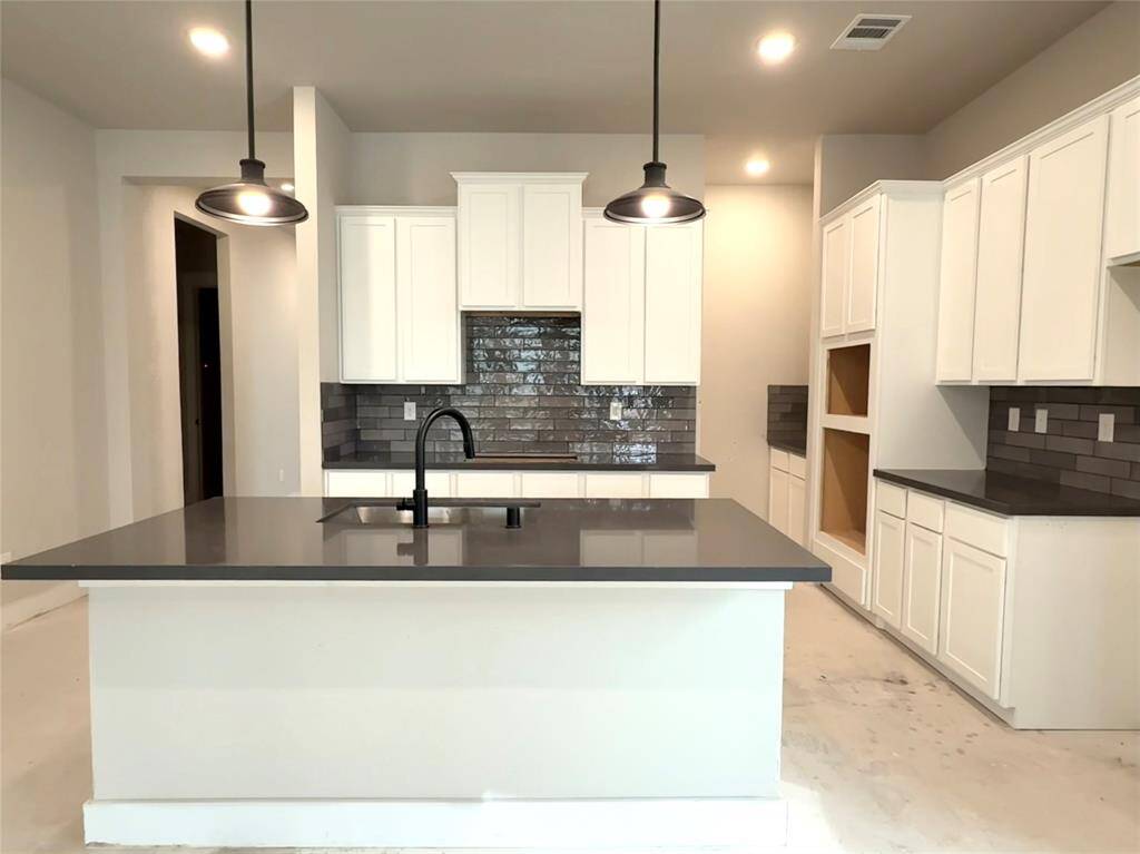 You can almost hear the sizzle of your favorite dish coming to life as you imagine yourself whipping up culinary delights in this dreamy kitchen.