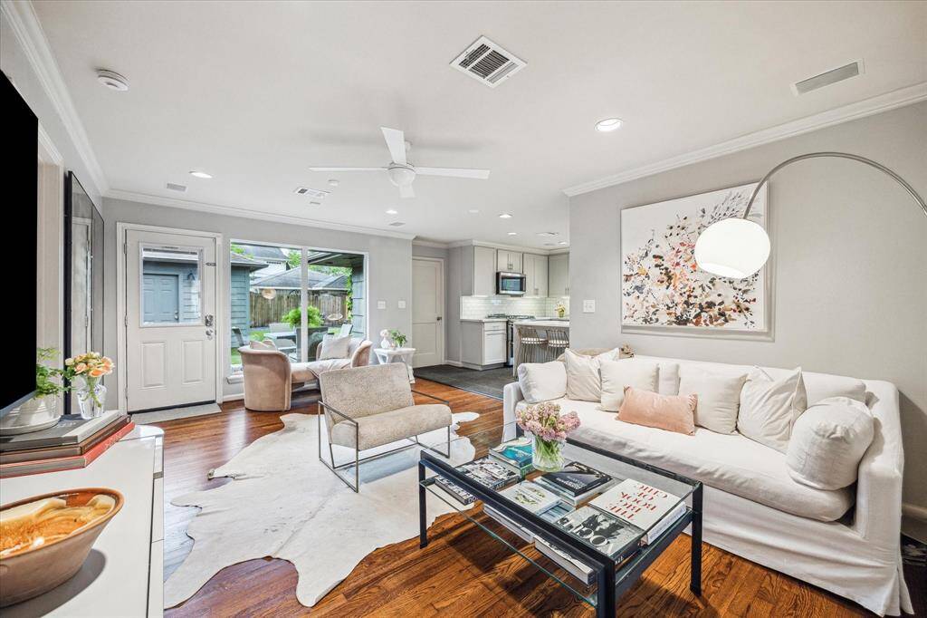 Family room open to the Kitchen with views of the backyard.